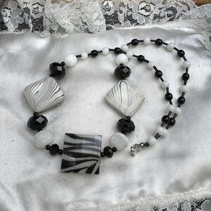 Black and white glass facated cut necklace